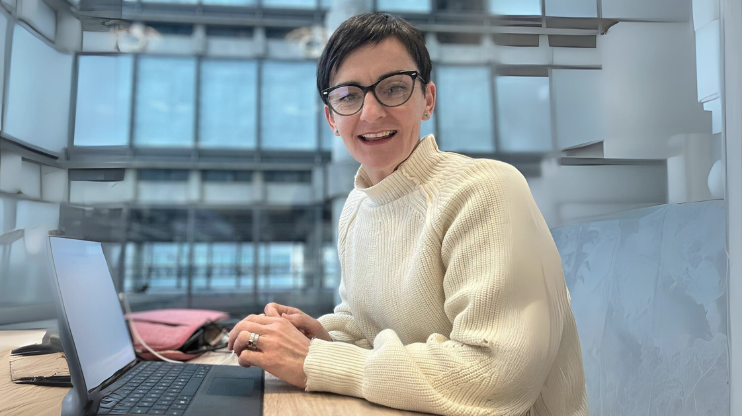 Managing Director Sharon Stanley at her computer.