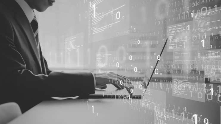 Man at laptop representing structured data